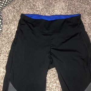 black, grey, and blue leggings